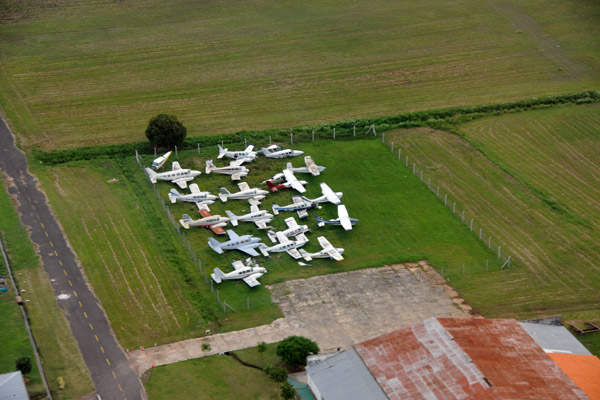 Light aircraft graveyard at the Paraguay Air Force Base at Campo Grande
