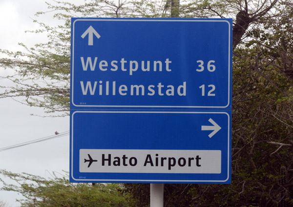 Road sign at the entrance to Hato Airport, Curaao