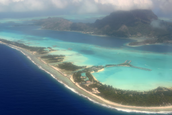 The eastern barrier islands of Bora Bora with the Intercontinental, Le Meridien and the St. Regis Resorts