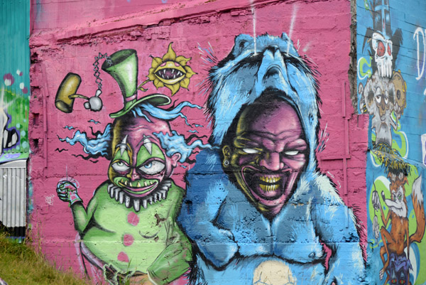 Mural of a clown and man in a blue raccoon costume, Reykjavk