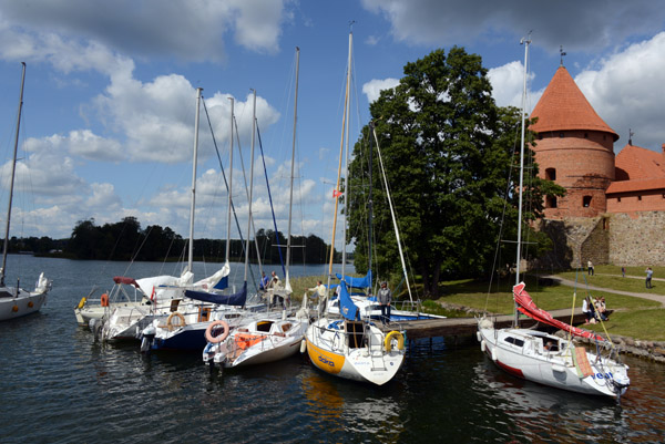 Sailboats docked at the island of Trakai Castle