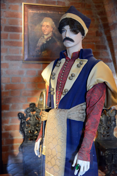 Mannekin with colorful traditional clothes, Trakai Castle