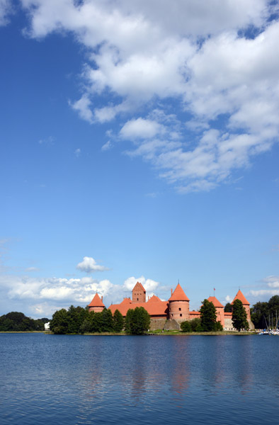 Blue sky and fair weather clouds over Trakai Castle