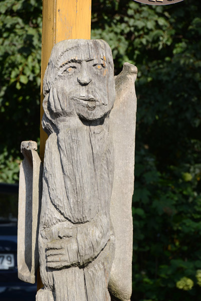 Woodcarving in front of the Suvenyra Shop Of Amber, Trakai