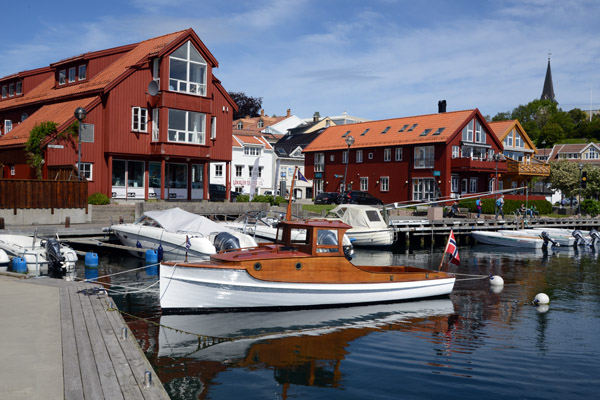 Classic wooden motorboat on the Grimstad waterfront