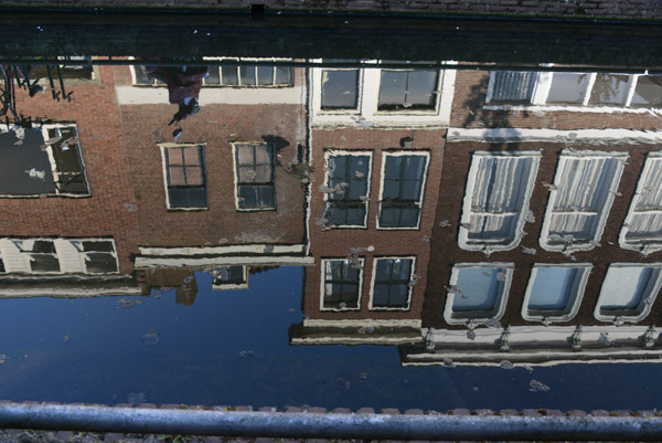Reflection of the buildings on Blauwstraat in the canal, Gouda