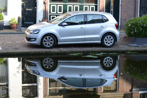 Reflection of a car in a Gouda canal