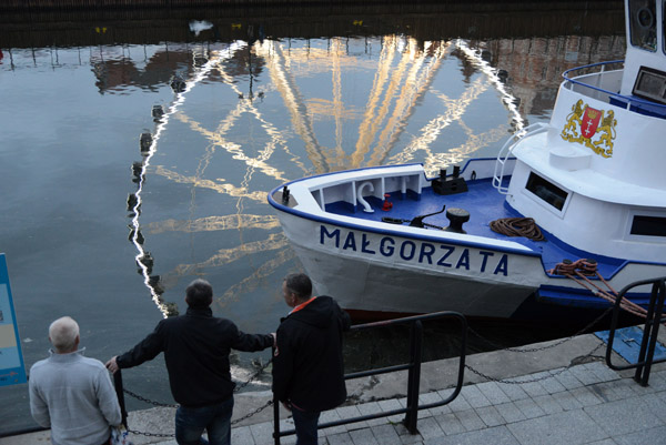 Reflection of a ferris wheel with the boat Małgorzata, Gdańsk