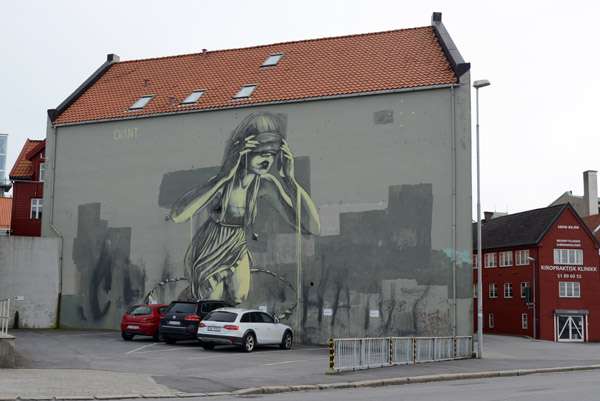 Brehaugen 5 mural of a masked girl, now covered by a new building, Stavanger