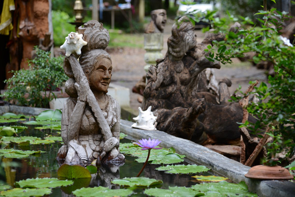 Sculpture in a pond at the sculpture shop, Kataragama