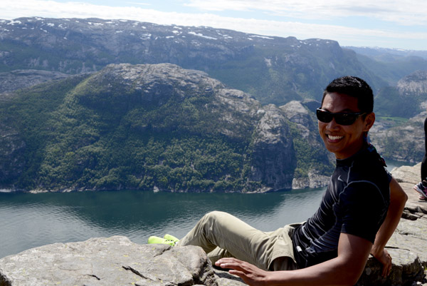 Dennis on the edge Preikestolen high above Lysefjord