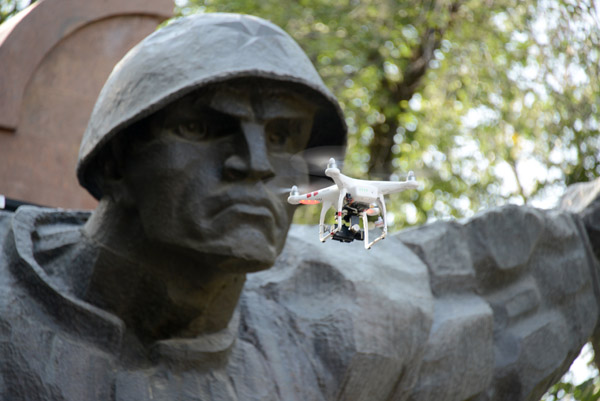 Soldier glaring angrily at the rather annoying buzzing drone 