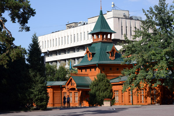 Traditional wooden building in Panfilov Park housing the Kazakh Museum of Musical Instruments