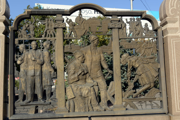 10 of these low relief bronze sculptures are arrayed in a semicircle on the north side of Republic Sq