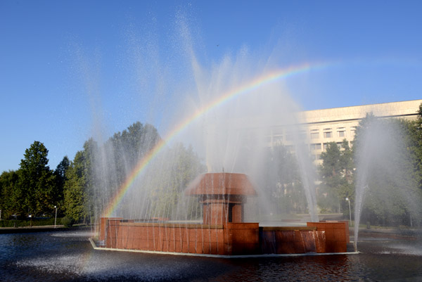 Rainbow through the fountain at the Almaty City Council, Republic Square