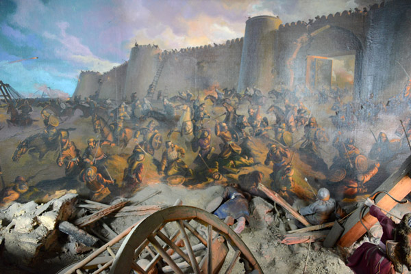 Mural of a battle in front of a walled Central Asian city
