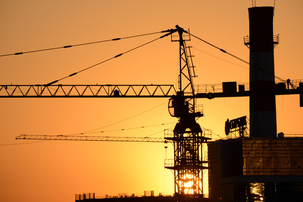 Construction Tower Crane at Sunset, Almaty, Kazakhstan