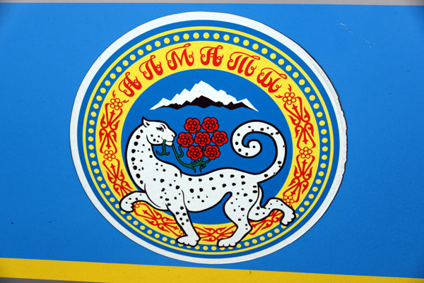 Snow Leopard logo of the city of Almaty on a bus