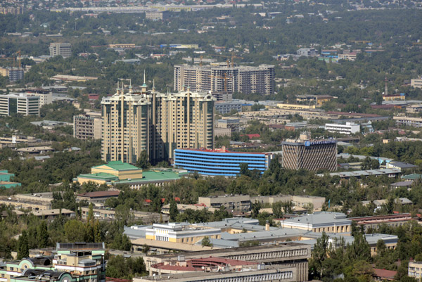High-rise Stolichniy Center with the blue-colored Almaty Hotel