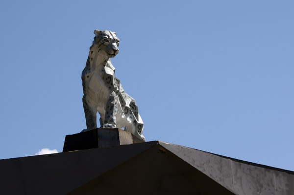 Snow leopard sculpture on Gornaya Street which leads to the mountain resort of Medeu