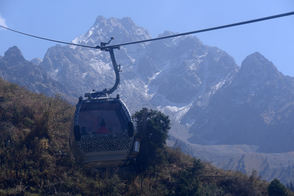 Abay Peak dominates the mountain panorama from the cable car