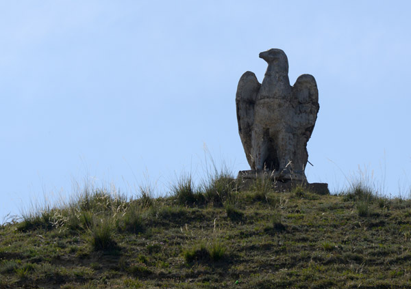 Another eagle statue on a hilltop, Raiymbek District