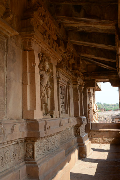 Shiva and other gods line the veranda of the Durga Temple