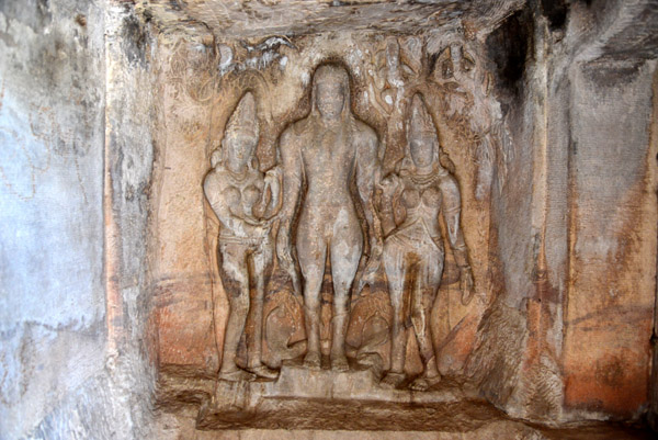 Bahubali with female attendants, Aihole
