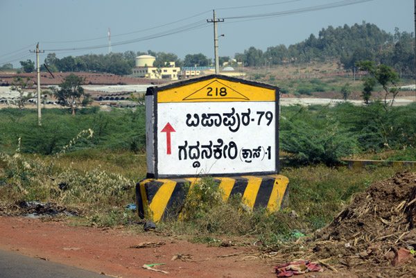 Kannada-language km marker on the Hwy 218 - 79 km to Bijapur
