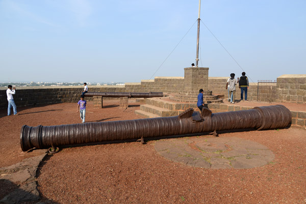 A pair of long cannon rest on top of the Upli Buruj