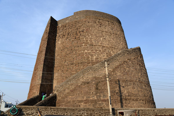 A spiral staircase circles around the outside of the tower