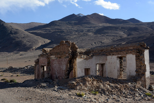 Graffiti covered ruin along the Pamir Highway