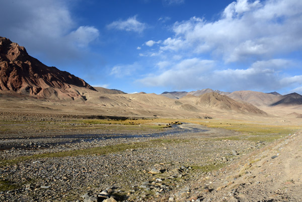 Stream in rocky terrain along the Pamir Highway