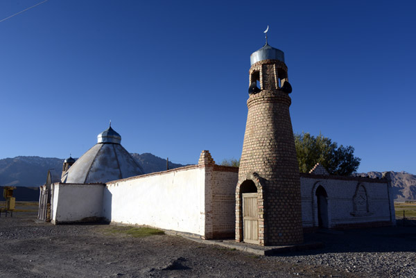 The rather stout mosque of Murghab sits just outside of town with a pair of brick minarets and a metal dome