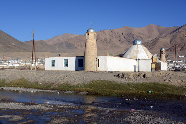 Mosque of Murghab with a small tributary of the Murghab river 