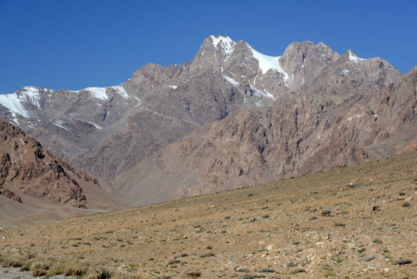 The Pamirs, rising from the high plateau, are just a taste of the stunning Hindu Kush to come