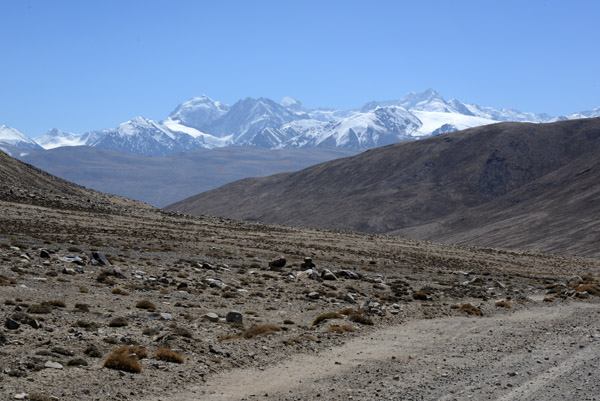 Descending to Khargush as Afghanistan comes into view with Kohe Belandtarin (6286m/20,623 ft) on the far right