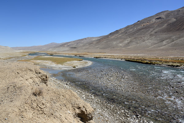 Here, the Pamir River looks shallow enough to be able to walk across to Afghanistan