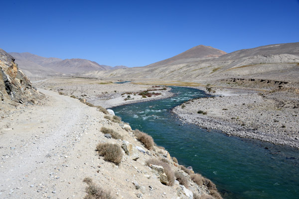 The Pamir Valley widens once again as the road returns to river level