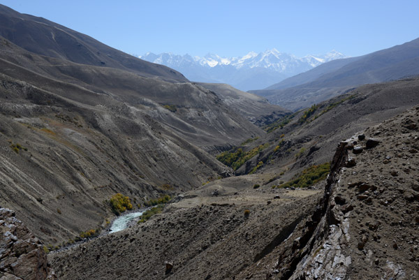 Our destination for tonight, the Wakhan Valley, is in front of the distant range of the Hindu Kush