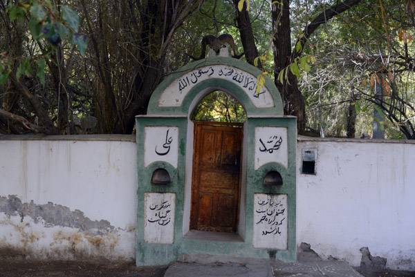 Across from the Langar Museum, the entrance to the mausoleum of Shoh Kambari Oftab, a Pamiri shrine-garden