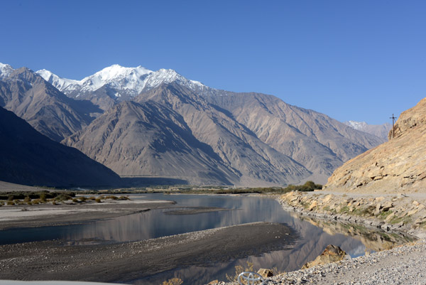 Wide Panj River of the Wakhan Valley with the mountains of Afghanistan