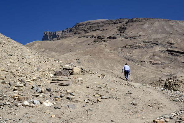 The driver leads the way up to the stupa at Vrang