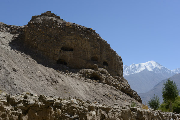 The Buddhist Monastery at Vrang with the stupa on top of the hill cut with caves