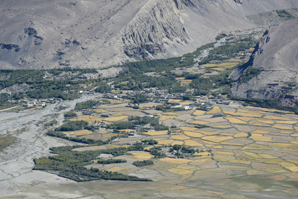 The agricultural fields of Khandud, Afghanistan, from the Yamchun Fortress, Tajikistan