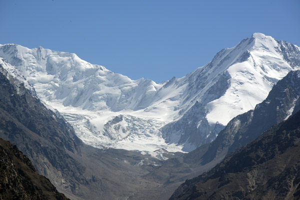 Glacier tumbling down from the high ridge of the Hindu Kush which forms the border between Afghanistan and Pakistan