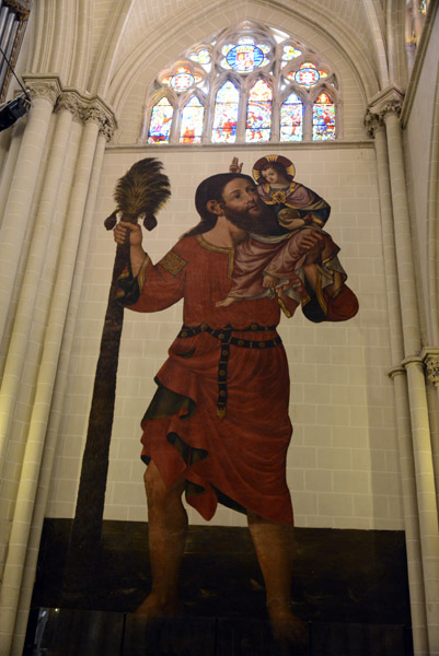 Medieval mural of St. Christopher carrying the Christ child, restored 1638 