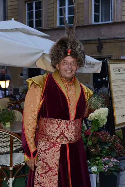 Man in an old-fashioned Polish costume at Pod Herbami