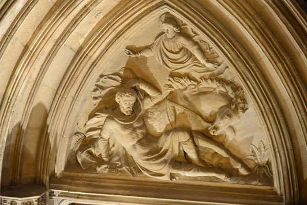 Neo-Gothic tympanum representing the conversion of Saint Paul on the road to Damascus