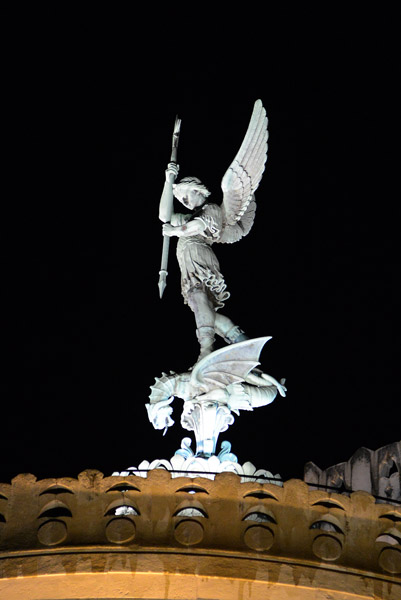 Statue of the Archangel Michae on top of the Basilica of Notre-Dame de Fourvière